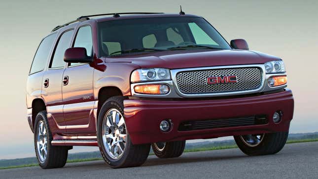 A photo of a red GMC Yukon SIV. 