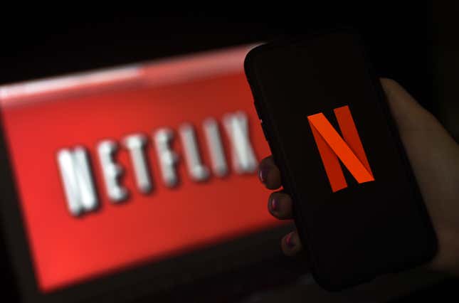 In this photo illustration a computer screen and mobile phone display the Netflix logo on March 31, 2020 in Arlington, Virginia.