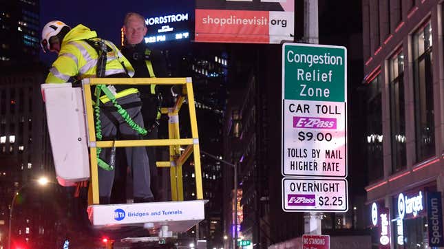 MTA Chair & CEO Janno Lieber with the final Congestion Relief Zone sign to be unveiled at Broadway & West 62nd St. on Saturday, Jan 4, 2025, hours before the Central Business District Tolling Program goes into effect.