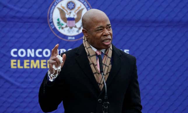 New York Mayor Eric Adams greets students and parents at Concourse Village Elementary School amid the recent spike in Covid-19 cases in the Bronx, New York, on January 3, 2022. - New Yorkers fears are growing of a return to the nightmare of 2020 when the city was the global epicenter of the pandemic. 