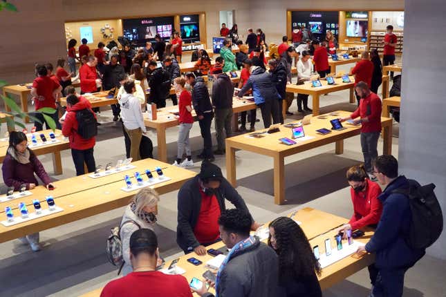 Apple iPhones and other products are displayed at an Apple store on November 28, 2022 in Chicago, Illinois. 