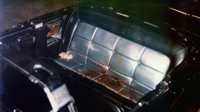 Photograph of the Kennedy limousine after assasination, Dallas. Dated 1963.