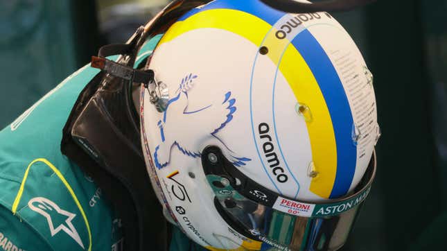 Image for article titled Sebastian Vettel Removes Controversial Flag From Helmet In Support of Ukraine