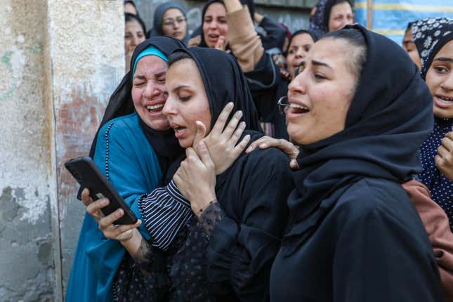 a group of women crying together