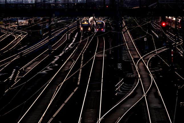 Two trains are pictured outside the central train station in Frankfurt, Germany, Tuesday, Jan. 9, 2024. The German Train Drivers&#39; Union (GDL) will strike starting Wednesday in a bitter dispute with the main national railway operator over working hours and pay. (AP Photo/Michael Probst)