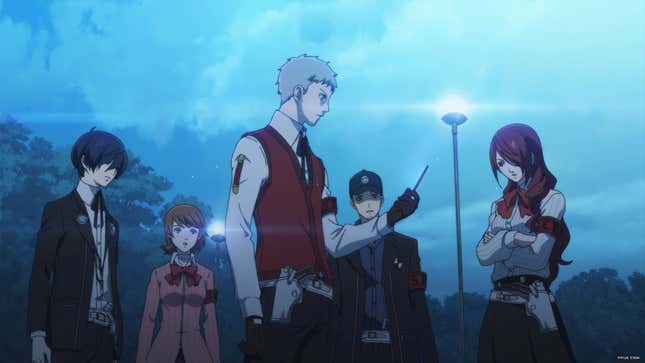 Akihiko looks at his phone as Makoto, Yukari, Junpei, and Mitsuru stand beside him.