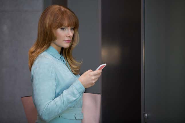 Bryce Dallas Howard checking her phone