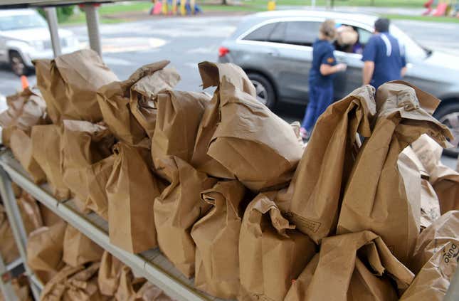 A rack with bags containing grab-and-go breakfasts and lunches at the Muhlenberg Elementary Center in Muhlenberg twp, PA, Thursday morning, September 10, 2020, where school district employees were distributing grab-and-go meals to students. 