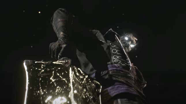 Simon wields a large sword.