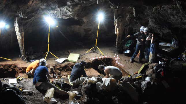 Archaeologists work in a Spanish cave.