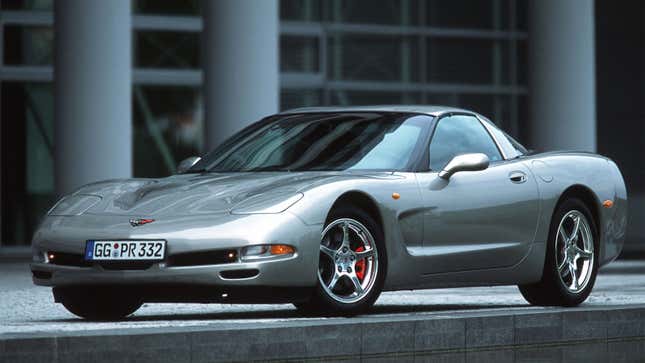 A photo of a silver C5 Corvette sports car. 