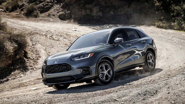 A photo of a grey Honda HR-V on a dirt track. 