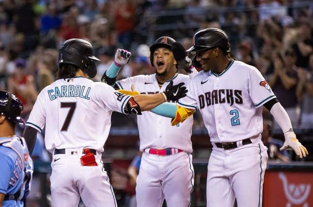 Corbin Carroll of the Arizona Diamondbacks celebrates with Geraldo