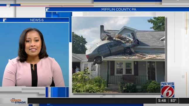 Screenshot of a news report of a car stuck in the second floor of a house