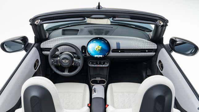 An overhead shot of the front seats and dash of the Mini Cooper Convertible 