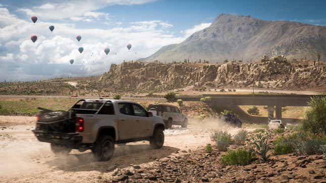 Cars race in the deserts of Mexico.