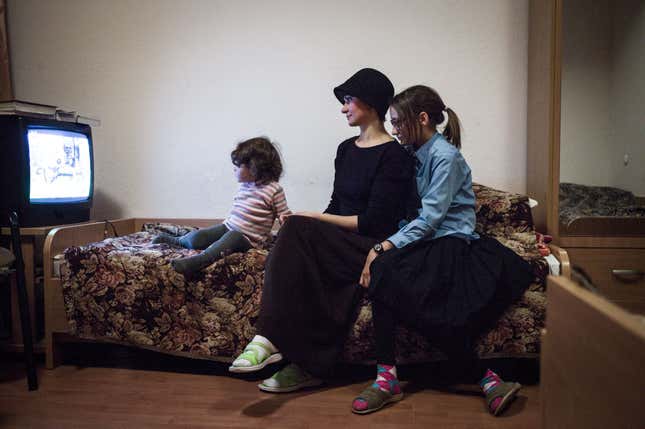 Sara Shtern-Cherkassky, whose husband Asher fights against pro-Russian separatists as a volunteer in the Dnipro Battalion, with her children.