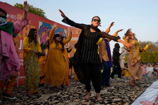 Activists from a socialist-feminist organization perform during a rally to mark International Women&#39;s Day, in Karachi, Pakistan, Friday, March 8, 2024. The day officially recognized by the United Nations in 1977, is celebrated around the world on March 8. (AP Photo/Fareed Khan)