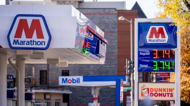 Gas prices are displayed at gas stations on Rhode Island Avenue on November 26, 2024 in Washington, DC. Gas prices have hit a 3-year low as millions of Americans take to the roads for Thanksgiving. 