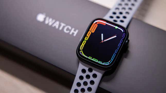 An apple watch alongside the packaging