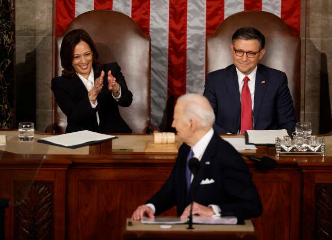 WASHINGTON, DC - MARCH 07: U.S. President Joe Biden looks back at Vice President Kamala Harris as he delivers his State of the Union address alongside Speaker of the House Mike Johnson (R-LA) during a joint meeting of Congress in the House chamber at the U.S. Capitol on March 07, 2024 in Washington, DC. This is Biden’s last State of the Union address before the general election this coming November. 