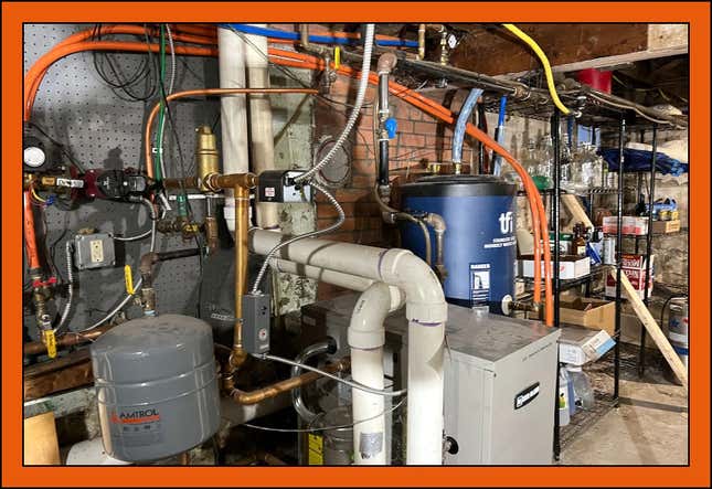 Our basement, with a boiler and old water heater