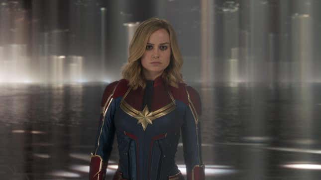 Captain Marvel looks at something off-screen with a determined expression.