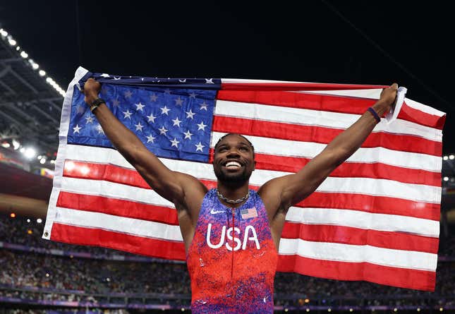 PARIS, FRANCE - AUGUST 04: Noah Lyles of Team United States celebrates winning the gold medal after competing the Men’s 100m Final on day nine of the Olympic Games Paris 2024 at Stade de France on August 04, 2024 in Paris, France.