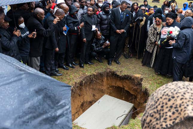 Patrick Lyoya’s mother, Dorcas, right, mourns as they lay her son to rest at Resurrection Cemetery in Wyoming, Mich. on Friday, April 22, 2022. Lyoya, 26, a Black man was killed April 4, 2022 by a white Grand Rapids, Mich. police officer.