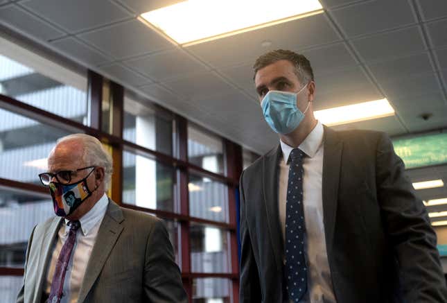  Former Minneapolis Police officer Thomas Lane (R) arrives with his attorney Earl Gray for a hearing at the Hennepin County Public Safety Facility on June 29, 2020 in Minneapolis, Minnesota. Lane is charged with aiding and abetting second-degree murder and aiding and abetting second-degree manslaughter in the death of George Floyd on May 25.