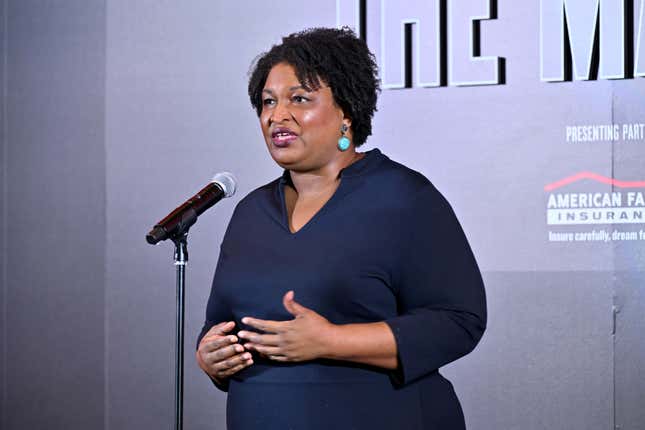 ATLANTA, GEORGIA - AUGUST 10: Stacey Abrams speaks onstage during TIME Honoring The March: An Impact Family Dinner at The National Center for Civil and Human Rights on August 10, 2023 in Atlanta, Georgia. 