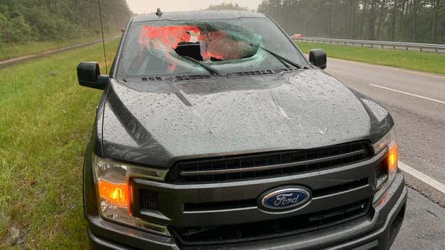 Image for article titled Lightning Strike Blasts Hunk Of Highway Through Ford Windshield, Injuring Two