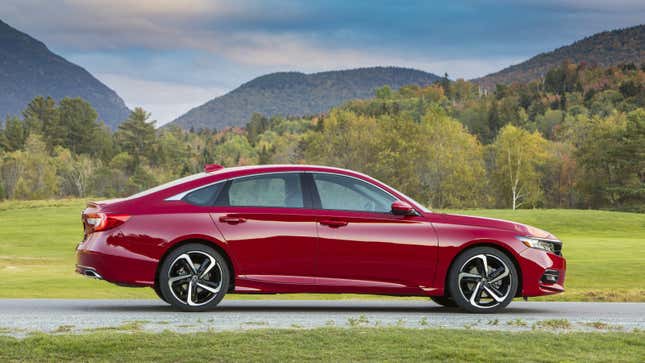 A photo of a red Honda Accord Sport sedan. 