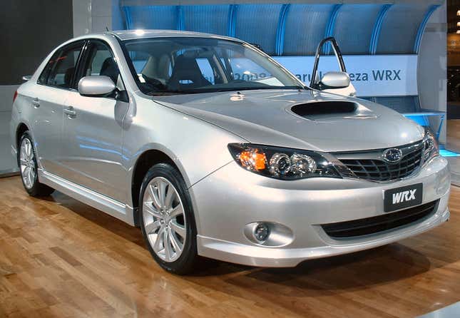 A 2008 Subaru WRX in silver looking incredibly plain.