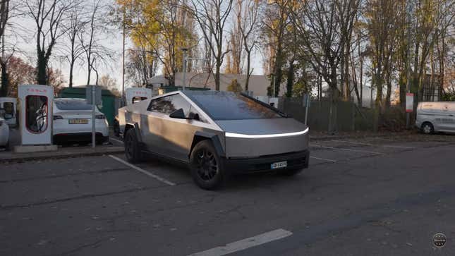 A photo of a Tesla Cybertruck parking at a charging point in the UK. 