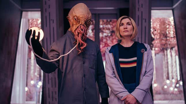 Jodie Whittaker's 13th Doctor looks concerned as she communes with a tentacle-faced alien Ood.