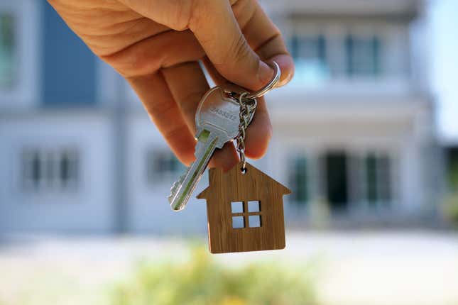 Landlord unlocks the house key for new home