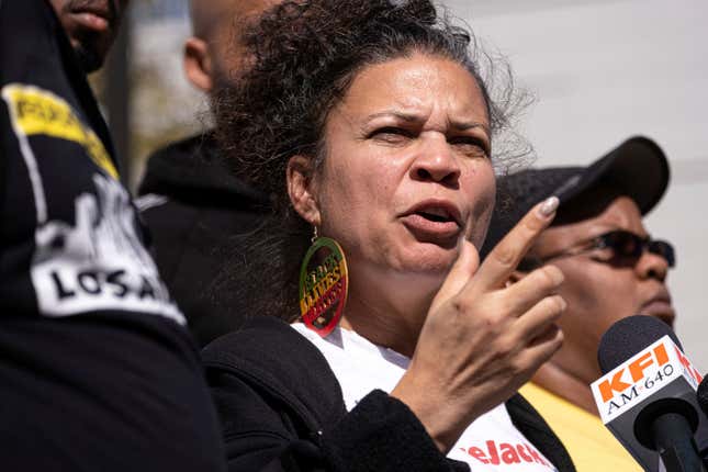 Melina Abdullah, of Black Lives Matter Los Angeles, talks about having a gun pointed at her by Los Angeles District Attorney Jackie Laceys’ husband while BLM was staging a protest Laceys’ home early Monday morning March 2, 2020.