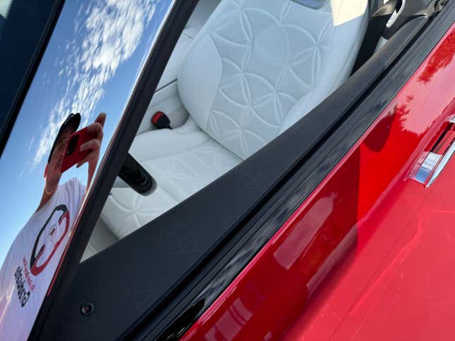 Interior trim detail of a red Mercedes-Maybach SL680 Monogram Series