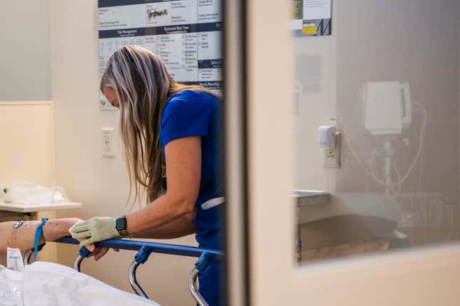 Emergency Room nurse tends to a patient at the Houston Methodist The Woodlands Hospital.