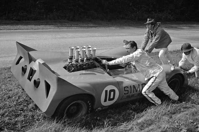 Chuck Parsons pushes the Lola T160 at the Road America CanAm on September 1, 1968 in Elkhart Lake, Wisconsin