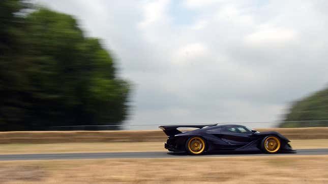 A side profile view of a Apollo Intensa Emozione supercar on a track. 