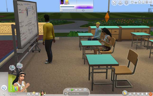 A Sim looks at their phone during class.
