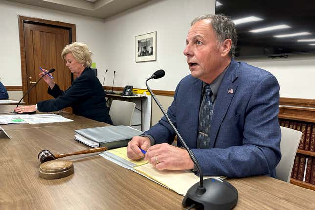 North Dakota Public Service Commission Chairman Randy Christmann, right, begins a meeting of the commission at the state Capitol in Bismarck, N.D., Friday, Sept. 15, 2023. At left is Commissioner Sheri Haugen-Hoffart. The panel, in a 2-1 vote, approved a request by Summit Carbon Solutions to reconsider the commission&#39;s Aug. 4 decision to deny a siting permit for the company&#39;s proposed 320-mile route in North Dakota. The leg is part of Summit&#39;s proposed $5.5 billion, 2,000-mile, five-state pipeline network to carry planet-warming carbon dioxide emissions from 30-some Midwestern ethanol plants to central North Dakota for permanent storage deep underground. (AP Photo/Jack Dura)