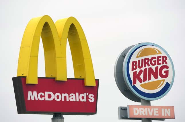 A McDonald’s and a Burger King at a highway rest stop. 