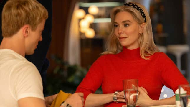 Johnny and Sue chat at the table.