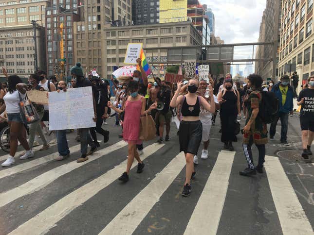 LGBTQ community members join demonstrators protesting police brutality and racial inequality in support of the Black Lives Matter movement as they assemble in Washington Square Park and then march south to the Occupy City Hall Protest Encampment at City Hall Park in Downtown Manhattan, New York City on July 24, 2020.