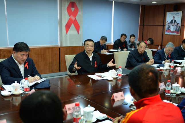 FILE- In this photo released by China&#39;s Xinhua News Agency, then Chinese Vice Premier Li Keqiang, center, speaks at a symposium attended by representatives of HIV/AIDS related non-governmental organizations and international organizations in Beijing, Nov. 26, 2012. Former Premier Li Keqiang, China&#39;s top economic official for a decade, died Friday, Oct. 27, 2023 of a heart attack. He was 68. (Ma Zhancheng/Xinhua via AP, File)