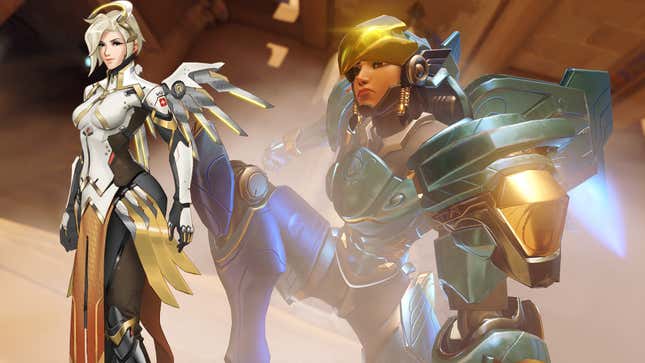 Pharah lands on the ground next to an image of Mercy.