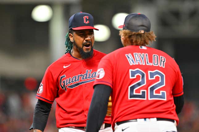 CLEVELAND, OHIO - SEPTEMBER 27: Closing pitcher Emmanuel Clase #48 celebrates with Josh Naylor #22 of the Cleveland Guardians after the last out to defeat the Cincinnati Reds at Progressive Field on September 27, 2023 in Cleveland, Ohio. The Guardians defeated the Reds 4-3.  (Photo by Jason Miller/Getty Images)